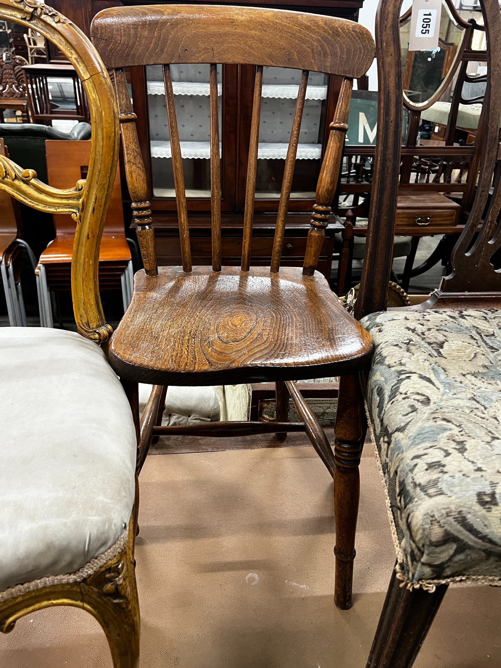 A George III mahogany dining chair, A Victorian elm and beech Windsor kitchen chair and a giltwood balloon back chair